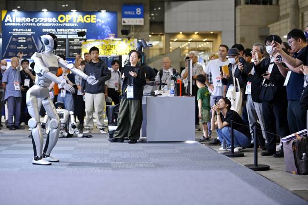 Japan showcases emerging technologies at CEATEC 2026 CHIBA, JAPAN - OCTOBER 13: Visitors explore technology exhibits during CEATEC 2026 at Makuhari Messe in Chiba, Japan, October 13, 2026. The four-day technology exhibition brings together 821 companies and organizations from Japan and abroad, showcasing innovations in artificial intelligence, robotics, digital technology and industrial solutions under the theme ÒTransformation.Ó David Mareuil Anadolu Chiba Japan. Editorial use only. Please get in touch for any other usage.  Copyright: x2026xAnadoluxDavidxMareuilx