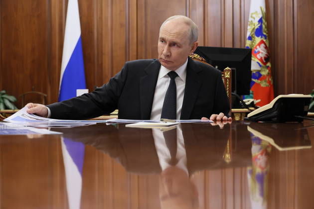 RUSSIA, MOSCOW - OCTOBER 13, 2026: Russian President Vladimir Putin is seen during a meeting with Russian Transport Minister Andrei Nikitin. Mikhail Metzel Russian Presidential Press and Information Office TASS 99231524