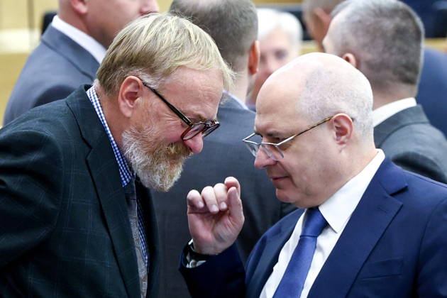 RUSSIA, MOSCOW - OCTOBER 13, 2026: Russian State Duma memberû Vitaly Milonov (L) and Sergei Gavrilov attend a plenary meeting of the Russian State Duma. Russian State Duma Press Office TASS  99238839