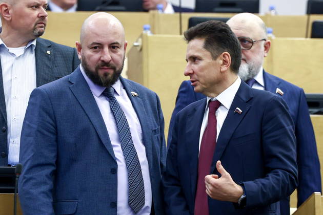 RUSSIA, MOSCOW - OCTOBER 13, 2026: Russian State Duma members Alexei Savin and Vyacheslav Petrov (L-R front) attend a plenary meeting of the Russian State Duma. Russian State Duma Press Office TASS  99239126