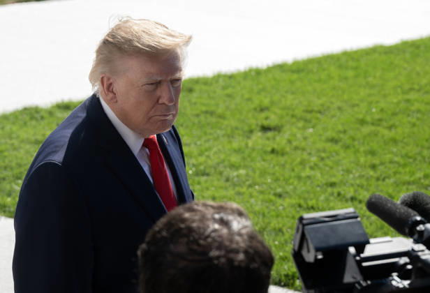 October 13, 2026, Washington, District Of Columbia, USA: United States President Donald J Trump speaks to reporters prior to departing for a campaign trip to Alaska, Nevada, Arizona and Montana from the South Lawn of the White House in Washington, DC, USA, on Tuesday, October 13, 2026 Washington USA - ZUMAs152 20261013_faa_s152_036 Copyright: xRonxSachs-CNPx