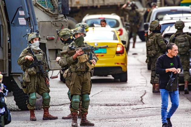 October 13, 2026, Ramallah, Palestine, State of: RAMALLAH, WEST BANK, PALESTINE, OCTOBER 13, 2026: Israeli forces conduct a raid in Ramallah in the occupied West Bank. The operation includes a raid on the offices of Addameer Prisoner Support and Human Rights Association. The Palestinian Ministry of Health reported two people wounded, including a 14-year-old boy wounded by Israeli gunfire, while several others were treated for tear gas inhalation. Ramallah Palestine, State of - ZUMAq101 20261013_zna_q101_201 Copyright: xSalmanxMohsenxAlkhatibx