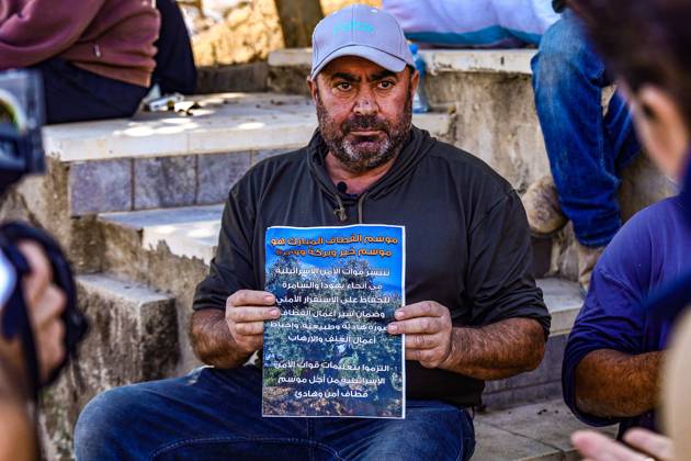 October 13, 2026, Ramallah: TURMUSAYA, WEST BANK, PALESTINE, OCTOBER 13, 2026: Palestinian residents and farmers are prevented by Israeli settlers and forces from reaching their agricultural land to harvest olives in Turmusaya, northeast of Ramallah, in the occupied West Bank. The restrictions disrupt the annual olive harvest, an important source of income for local farming families. Ramallah - ZUMAq101 20261013_zna_q101_227 Copyright: xSalmanxMohsenxAlkhatibx