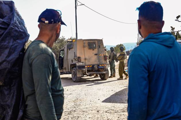 October 13, 2026, Ramallah: TURMUSAYA, WEST BANK, PALESTINE, OCTOBER 13, 2026: Palestinian residents and farmers are prevented by Israeli settlers and forces from reaching their agricultural land to harvest olives in Turmusaya, northeast of Ramallah, in the occupied West Bank. The restrictions disrupt the annual olive harvest, an important source of income for local farming families. Ramallah - ZUMAq101 20261013_zna_q101_222 Copyright: xSalmanxMohsenxAlkhatibx