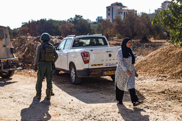 October 13, 2026, Ramallah: TURMUSAYA, WEST BANK, PALESTINE, OCTOBER 13, 2026: Palestinian residents and farmers are prevented by Israeli settlers and forces from reaching their agricultural land to harvest olives in Turmusaya, northeast of Ramallah, in the occupied West Bank. The restrictions disrupt the annual olive harvest, an important source of income for local farming families. Ramallah - ZUMAq101 20261013_zna_q101_224 Copyright: xSalmanxMohsenxAlkhatibx
