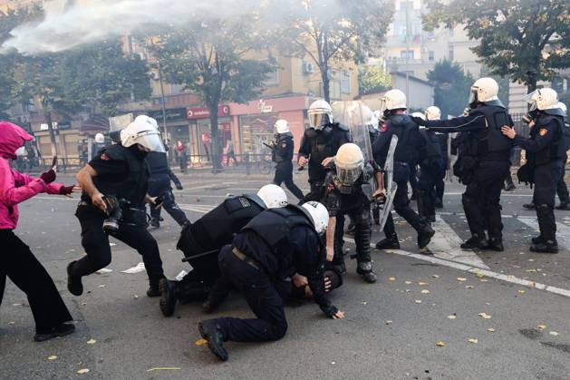 October 13, 2026, Tirana, Albania: TIRANA, ALBANIA, OCTOBER 13, 2026: Student demonstrators clash with riot police outside the Ministry of Education in Tirana during a protest over university conditions, higher education costs and employment prospects. Police deploy tear gas and water cannons as protesters throw bricks and other objects. Several demonstrators are detained. Tirana Albania - ZUMAq101 20261013_zna_q101_260 Copyright: xVlasovxSulajx
