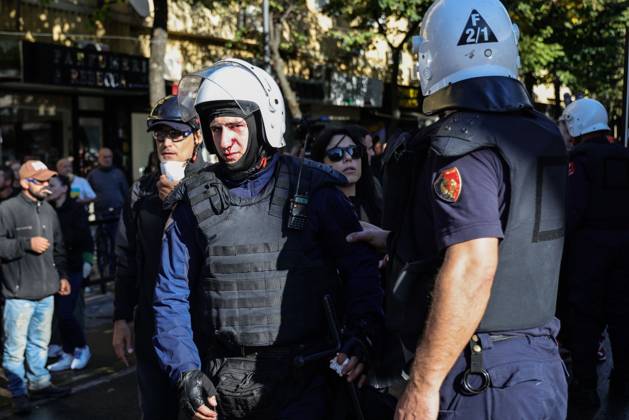 October 13, 2026, Tirana, Albania: TIRANA, ALBANIA, OCTOBER 13, 2026: Student demonstrators clash with riot police outside the Ministry of Education in Tirana during a protest over university conditions, higher education costs and employment prospects. Police deploy tear gas and water cannons as protesters throw bricks and other objects. Several demonstrators are detained. Tirana Albania - ZUMAq101 20261013_zna_q101_263 Copyright: xVlasovxSulajx