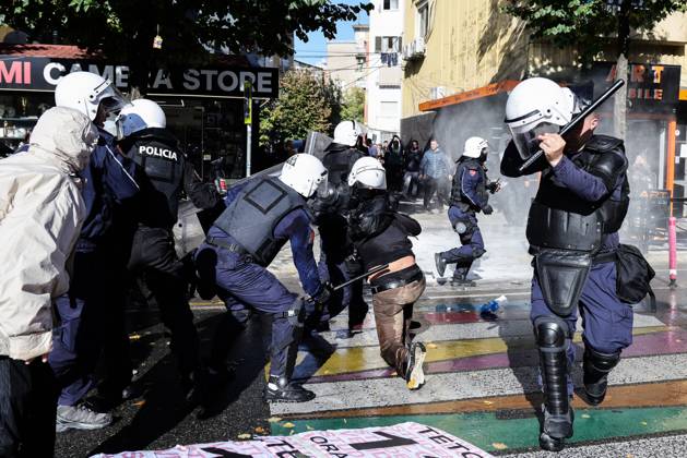 October 13, 2026, Tirana, Albania: TIRANA, ALBANIA, OCTOBER 13, 2026: Student demonstrators clash with riot police outside the Ministry of Education in Tirana during a protest over university conditions, higher education costs and employment prospects. Police deploy tear gas and water cannons as protesters throw bricks and other objects. Several demonstrators are detained. Tirana Albania - ZUMAq101 20261013_zna_q101_266 Copyright: xVlasovxSulajx