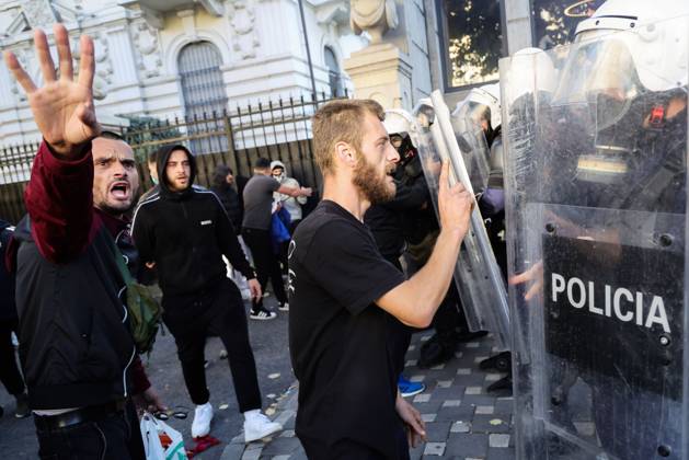 October 13, 2026, Tirana, Albania: TIRANA, ALBANIA, OCTOBER 13, 2026: Student demonstrators clash with riot police outside the Ministry of Education in Tirana during a protest over university conditions, higher education costs and employment prospects. Police deploy tear gas and water cannons as protesters throw bricks and other objects. Several demonstrators are detained. Tirana Albania - ZUMAq101 20261013_zna_q101_268 Copyright: xVlasovxSulajx