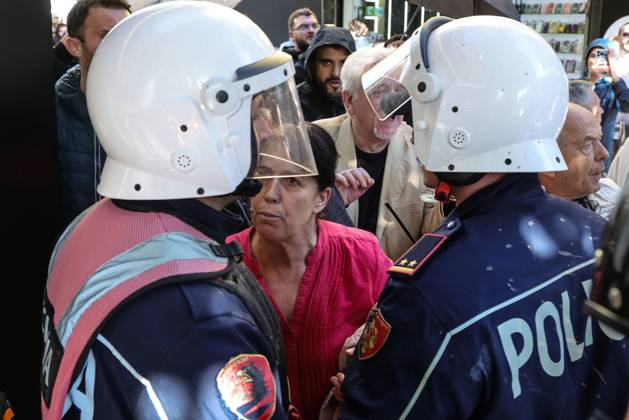October 13, 2026, Tirana, Albania: TIRANA, ALBANIA, OCTOBER 13, 2026: Student demonstrators clash with riot police outside the Ministry of Education in Tirana during a protest over university conditions, higher education costs and employment prospects. Police deploy tear gas and water cannons as protesters throw bricks and other objects. Several demonstrators are detained. Tirana Albania - ZUMAq101 20261013_zna_q101_269 Copyright: xVlasovxSulajx