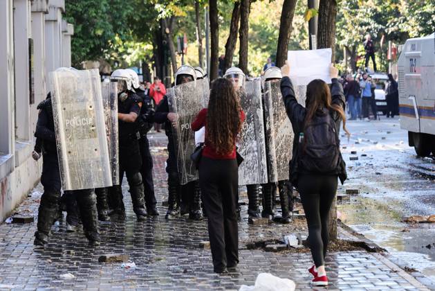 October 13, 2026, Tirana, Albania: TIRANA, ALBANIA, OCTOBER 13, 2026: Student demonstrators clash with riot police outside the Ministry of Education in Tirana during a protest over university conditions, higher education costs and employment prospects. Police deploy tear gas and water cannons as protesters throw bricks and other objects. Several demonstrators are detained. Tirana Albania - ZUMAq101 20261013_zna_q101_275 Copyright: xVlasovxSulajx