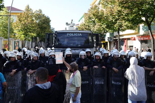 October 13, 2026, Tirana, Albania: TIRANA, ALBANIA, OCTOBER 13, 2026: Student demonstrators clash with riot police outside the Ministry of Education in Tirana during a protest over university conditions, higher education costs and employment prospects. Police deploy tear gas and water cannons as protesters throw bricks and other objects. Several demonstrators are detained. Tirana Albania - ZUMAq101 20261013_zna_q101_276 Copyright: xVlasovxSulajx