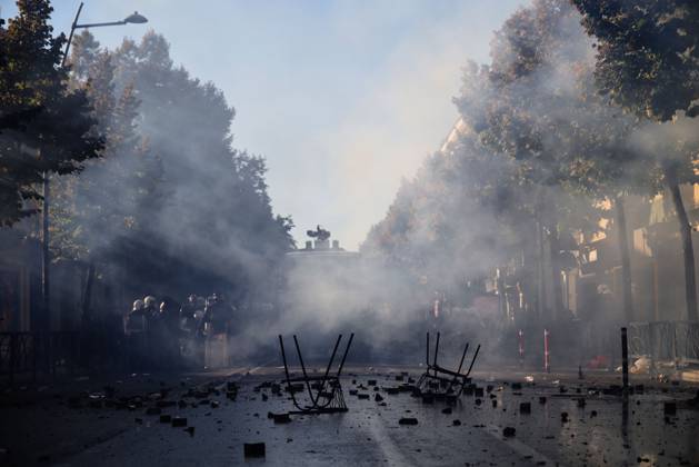 October 13, 2026, Tirana, Albania: TIRANA, ALBANIA, OCTOBER 13, 2026: Student demonstrators clash with riot police outside the Ministry of Education in Tirana during a protest over university conditions, higher education costs and employment prospects. Police deploy tear gas and water cannons as protesters throw bricks and other objects. Several demonstrators are detained. Tirana Albania - ZUMAq101 20261013_zna_q101_278 Copyright: xVlasovxSulajx