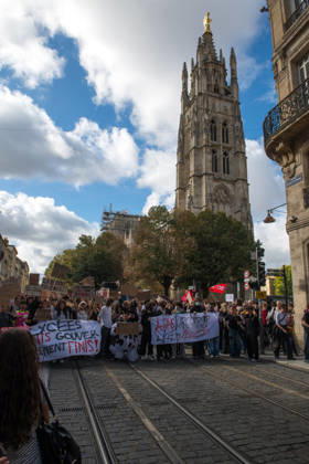 High School Stdent Mobilisation - Bordeaux High school students march behind banners along the tram tracks, with the Pey-Berland Tower in the background, during Act V of the high school student mobilisation in Bordeaux, France on October 13, 2026, protesting against education reforms. Photo by Fabrice Sapte ABACAPRESS.COM Bordeaux France  Copyright: xSaptexFabrice ABACAx