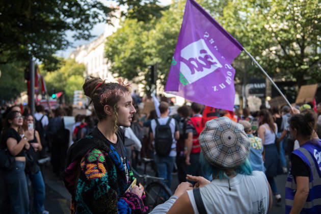High School Stdent Mobilisation - Bordeaux Protesters talk within the march, with a purple trade union flag in the background, during Act V of the high school student mobilisation in Bordeaux, France on October 13, 2026. Photo by Fabrice Sapte ABACAPRESS.COM Bordeaux France  Copyright: xSaptexFabrice ABACAx