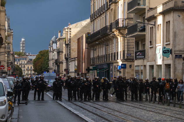 High School Stdent Mobilisation - Bordeaux A cordon of police officers in riot gear blocks a street and the tram tracks during Act V of the high school student mobilisation in Bordeaux, France on October 13, 2026. Photo by Fabrice Sapte ABACAPRESS.COM Bordeaux France  Copyright: xSaptexFabrice ABACAx