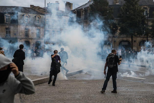 High School Stdent Mobilisation - Bordeaux Protesters move through clouds of tear gas, some covering their faces, at Place de la Victoire in Bordeaux during Act V of the high school student mobilisation, France on October 13, 2026. Photo by Fabrice Sapte ABACAPRESS.COM Bordeaux France  Copyright: xSaptexFabrice ABACAx