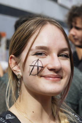 High School Student Mobilisation - Toulouse A young woman with an - A - (for anarchy) on her cheek. Act V of the secondary school and university students protests. Young people and the world of work are continuing their joint mobilisation and demands for adequate resources for education, better study conditions, an end to student precariousness, and access to housing. France, Toulouse, 13 October 2026. Photo by Patricia Huchot-Boissier AbacaPress.com. TOULOUSE OCCITANIE France Copyright: xHuchot-BoissierxPatricia ABACAx