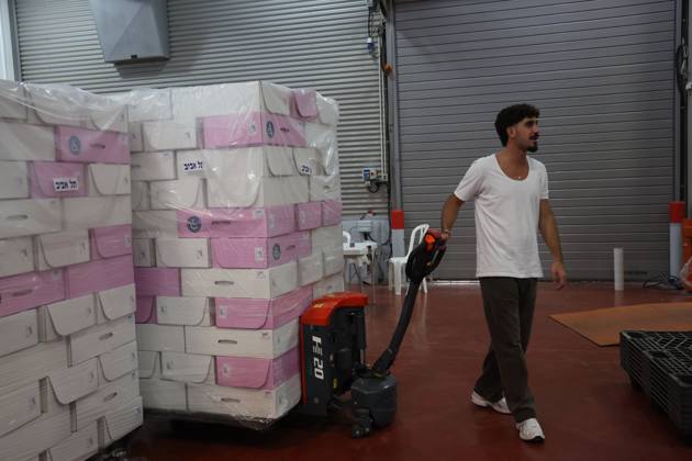 October 14, 2026, Shoham, Israel: SHOHAM, ISRAEL, OCTOBER 14, 2026: Preparations for Israel™s upcoming parliamentary elections at the Central Elections Committee™s logistics centre in Shoham. Workers organise and pack voting materials and polling station equipment during a media tour of the facility. Shoham Israel - ZUMAq101 20261014_zna_q101_162 Copyright: xSaeedxQaqx