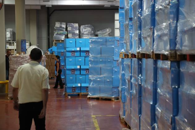 October 14, 2026, Shoham, Israel: SHOHAM, ISRAEL, OCTOBER 14, 2026: Preparations for Israel™s upcoming parliamentary elections at the Central Elections Committee™s logistics centre in Shoham. Workers organise and pack voting materials and polling station equipment during a media tour of the facility. Shoham Israel - ZUMAq101 20261014_zna_q101_172 Copyright: xSaeedxQaqx