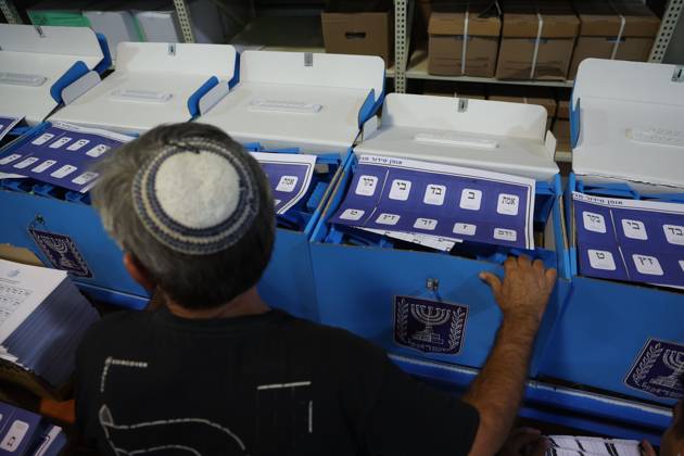 October 14, 2026, Shoham, Israel: SHOHAM, ISRAEL, OCTOBER 14, 2026: Preparations for Israel™s upcoming parliamentary elections at the Central Elections Committee™s logistics centre in Shoham. Workers organise and pack voting materials and polling station equipment during a media tour of the facility. Shoham Israel - ZUMAq101 20261014_zna_q101_173 Copyright: xSaeedxQaqx