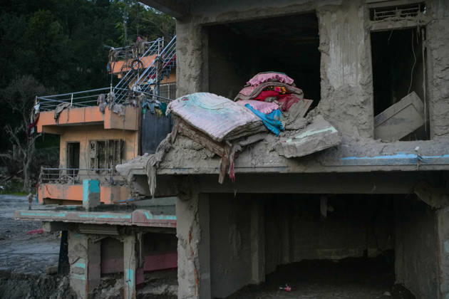 Aftermath of flash floods in Nepal RASUWA, NEPAL - OCTOBER 14 : Houses damaged by devastating flash floods are seen in Rasuwa dristrict, Nepal on October 14, 2026. Road and pedestrian connectivity has been restored with the construction of a new suspension bridge over the Trishuli River, allowing local residents to cross the river after the devastating floods damaged bridges and other infrastructure in the area. Sunil Pradhan Anadolu Rasuwa Nepal. Editorial use only. Please get in touch for any other usage.  Copyright: x2026xAnadoluxSunilxPradhanx