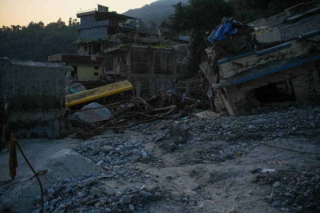 Aftermath of flash floods in Nepal RASUWA, NEPAL - OCTOBER 14 : Houses damaged by devastating flash floods are seen in Rasuwa dristrict, Nepal on October 14, 2026. Road and pedestrian connectivity has been restored with the construction of a new suspension bridge over the Trishuli River, allowing local residents to cross the river after the devastating floods damaged bridges and other infrastructure in the area. Sunil Pradhan Anadolu Rasuwa Nepal. Editorial use only. Please get in touch for any other usage.  Copyright: x2026xAnadoluxSunilxPradhanx