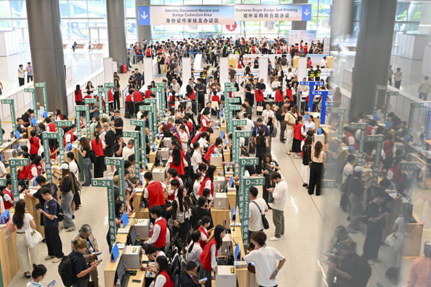 GUANGZHOU, CHINA - OCTOBER 15: Overseas buyers register for entry permits at the registration hall of the 140th China Import and Export Fair (Canton Fair) on October 15, 2026 in Guangzhou, Guangdong Province of China. The fair runs in three phases until November 4, covering a total exhibition area of 1.55 million square meters.  Copyright: xChinaxNewsxServicex 111674428863