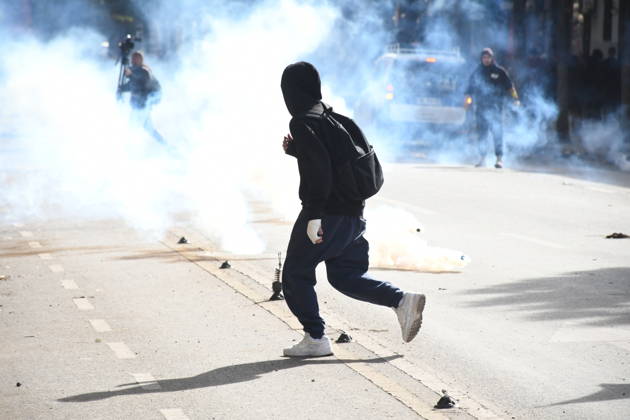 Student protests demanding improved educational conditions continue in Albania TIRANA, ALBANIA - OCTOBER 15: A protester runs through clouds of tear gas during clashes with police on the third day of demonstrations demanding improved educational conditions in Tirana, Albania, on October 15, 2026. University students are joined by high school students and local residents as police use tear gas to disperse demonstrators outside the Ministry of Education and the Parliament building, while protesters throw stones and other objects at police officers. Olsi Shehu Anadolu Tirana Albania. Editorial use only. Please get in touch for any other usage.  Copyright: x2026xAnadoluxOlsixShehux