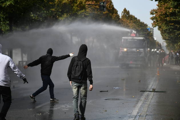 Student protests demanding improved educational conditions continue in Albania TIRANA, ALBANIA - OCTOBER 15: A police water cannon sprays water toward demonstrators during the third day of protests demanding improved educational conditions in Tirana, Albania, on October 15, 2026. University students are joined by high school students and local residents as tensions escalate, with police using tear gas to disperse demonstrators outside the Ministry of Education and the Parliament building, while protesters throw stones and other objects at police officers. Olsi Shehu Anadolu Tirana Albania. Editorial use only. Please get in touch for any other usage.  Copyright: x2026xAnadoluxOlsixShehux