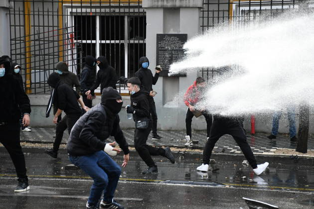 Student protests demanding improved educational conditions continue in Albania TIRANA, ALBANIA - OCTOBER 15: Protesters clash with police as a water cannon sprays water toward demonstrators during the third day of protests demanding improved educational conditions in Tirana, Albania, on October 15, 2026. University students are joined by high school students and local residents as tensions escalate, with police using tear gas to disperse demonstrators outside the Ministry of Education and the Parliament building, while protesters throw stones and other objects at police officers. Olsi Shehu Anadolu Tirana Albania. Editorial use only. Please get in touch for any other usage.  Copyright: x2026xAnadoluxOlsixShehux