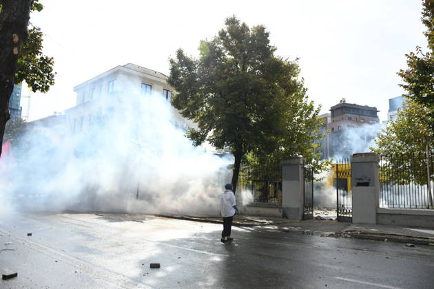 Student protests demanding improved educational conditions continue in Albania TIRANA, ALBANIA - OCTOBER 15: Thick clouds of tear gas fill a street during clashes between protesters and police on the third day of demonstrations demanding improved educational conditions in Tirana, Albania, on October 15, 2026. University students are joined by high school students and local residents as tensions escalate, with police using tear gas to disperse demonstrators outside the Ministry of Education and the Parliament building, while protesters throw stones and other objects at police officers. Olsi Shehu Anadolu Tirana Albania. Editorial use only. Please get in touch for any other usage.  Copyright: x2026xAnadoluxOlsixShehux