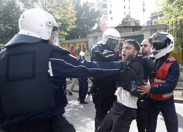 Protesters Clash with Police During a Demonstration in Tirana, Albania. Riot police detain a protester during an anti-government demonstration in central Tirana on October 15, 2026, as protests continued for a third consecutive day over university conditions and demands for the resignation of Albanian Prime Minister Edi Rama. The latest rally follows two nights of violence in the capital, during which protesters and riot police clashed, police used water cannons and tear gas, and demonstrators damaged government offices and shops and set fire to several buildings. Light Studio Agency Malton Dibra Tirana Albania Copyright: xLightxStudioxAgencyx xMaltonxDibrax