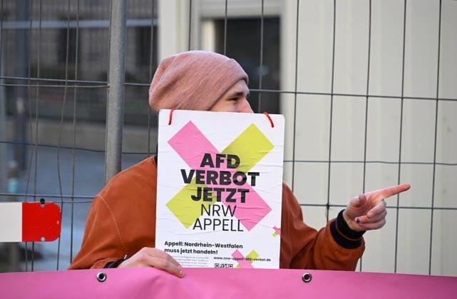 Rally calling for an AfD ban in Berlin BERLIN, GERMANY - OCTOBER 16: People take part in a rally near the Bundesrat calling for proceedings to ban the far-right Alternative for Germany (AfD) party and urge North Rhine-Westphalia Minister-President Hendrik Wüst to support their demand, as he is set to be elected President of the Bundesrat that day, in Berlin, Germany, on 16 October 2026. The rally is organized by the alliance NRW Appeal: AfD Ban Now, which reportedly collected more than 120,000 signatures in support of an AfD ban in North Rhine-Westphalia and is urging the Bundesrat to initiate proceedings before the Federal Constitutional Court to ban the party. Volodymyr Sindieiev Anadolu Berlin Germany. Editorial use only. Please get Copyright: x2026xAnadoluxVolodymyrxSindieievx
