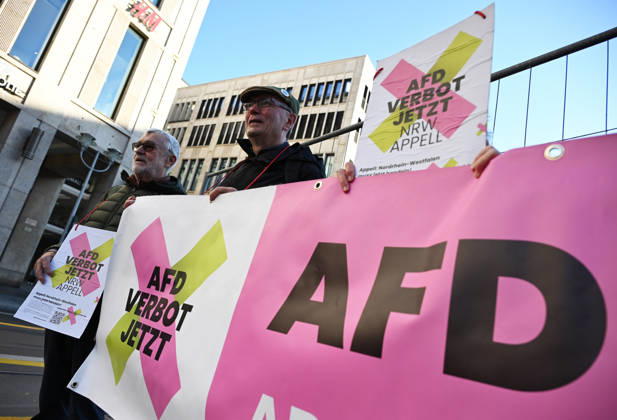 Rally calling for an AfD ban in Berlin BERLIN, GERMANY - OCTOBER 16: People take part in a rally near the Bundesrat calling for proceedings to ban the far-right Alternative for Germany (AfD) party and urge North Rhine-Westphalia Minister-President Hendrik Wüst to support their demand, as he is set to be elected President of the Bundesrat that day, in Berlin, Germany, on 16 October 2026. The rally is organized by the alliance NRW Appeal: AfD Ban Now, which reportedly collected more than 120,000 signatures in support of an AfD ban in North Rhine-Westphalia and is urging the Bundesrat to initiate proceedings before the Federal Constitutional Court to ban the party. Volodymyr Sindieiev Anadolu Berlin Germany. Editorial use only. Please get Copyright: x2026xAnadoluxVolodymyrxSindieievx