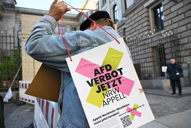 Rally calling for an AfD ban in Berlin BERLIN, GERMANY - OCTOBER 16: People take part in a rally near the Bundesrat calling for proceedings to ban the far-right Alternative for Germany (AfD) party and urge North Rhine-Westphalia Minister-President Hendrik Wüst to support their demand, as he is set to be elected President of the Bundesrat that day, in Berlin, Germany, on 16 October 2026. The rally is organized by the alliance NRW Appeal: AfD Ban Now, which reportedly collected more than 120,000 signatures in support of an AfD ban in North Rhine-Westphalia and is urging the Bundesrat to initiate proceedings before the Federal Constitutional Court to ban the party. Volodymyr Sindieiev Anadolu Berlin Germany. Editorial use only. Please get Copyright: x2026xAnadoluxVolodymyrxSindieievx