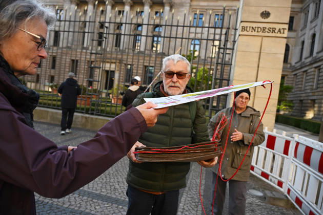 Rally calling for an AfD ban in Berlin BERLIN, GERMANY - OCTOBER 16: People take part in a rally near the Bundesrat calling for proceedings to ban the far-right Alternative for Germany (AfD) party and urge North Rhine-Westphalia Minister-President Hendrik Wüst to support their demand, as he is set to be elected President of the Bundesrat that day, in Berlin, Germany, on 16 October 2026. The rally is organized by the alliance NRW Appeal: AfD Ban Now, which reportedly collected more than 120,000 signatures in support of an AfD ban in North Rhine-Westphalia and is urging the Bundesrat to initiate proceedings before the Federal Constitutional Court to ban the party. Volodymyr Sindieiev Anadolu Berlin Germany. Editorial use only. Please get Copyright: x2026xAnadoluxVolodymyrxSindieievx