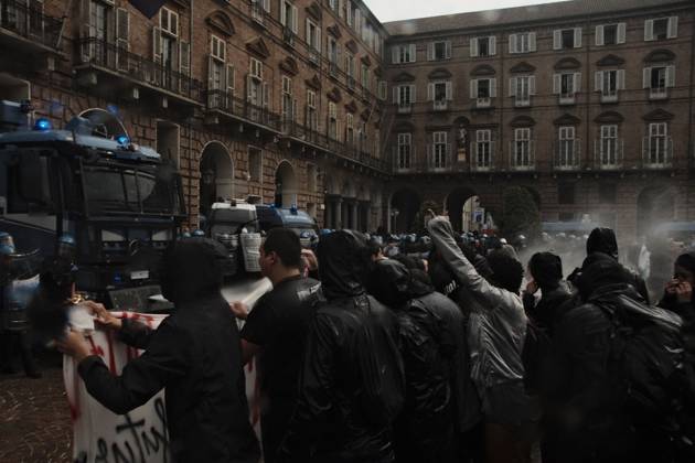 October 16, 2026, Turin, Italy: TURIN, ITALY, OCTOBER 16, 2026: Students demonstrate against deteriorating school buildings, insufficient education funding and job insecurity, calling for greater investment in education rather than military spending. Clashes break out in Piazza Castello, where police use water cannons and charge demonstrators. Earlier along the route, teachers link arms between students and police to prevent confrontation. Turin Italy - ZUMAq101 20261016_zna_q101_141 Copyright: xJulianxNelajx