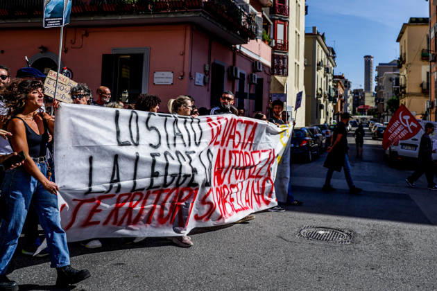 IPA89763019 - NAPLES, ITALY — OCTOBER 16, 2026: Environmental activists, students, and unemployed people take to the streets in the Bagnoli district of Naples to protest the city government’s handling of the environmental remediation of the former Italsider steelworks site. The demonstration focuses on the ongoing redevelopment work in the area, where facilities for the 38th Louis Vuitton America’s Cup—scheduled to take place in Naples in 2027—are being built. Protesters raise concerns about environmental protection, the remediation process, and the project’s impact on the local community.  Copyright: xAntonioxBalasco LiveMediax xAntonioxBalasco LiveMediax IPA89763019