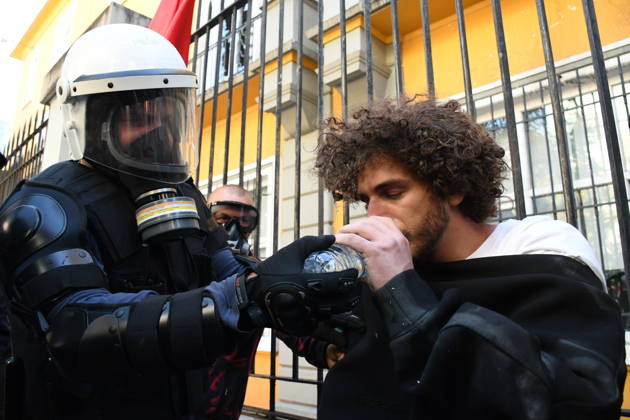 Demonstrations organized by students demanding improvements to their educational conditions continue in Albania TIRANA, ALBANIA - OCTOBER 16: Police officers render first aid to a student demonstrator who fell ill during intense clashes and tear gas deployment in Tirana, Albania on October 16, 2026. Protests demanding enhanced university educational conditions and financial relief saw escalating tension, during which police provided immediate medical assistance to affected individuals amidst heavy smoke and crowd dispersal operations. Olsi Shehu Anadolu Tirana Albania. Editorial use only. Please get in touch for any other usage.  Copyright: x2026xAnadoluxOlsixShehux