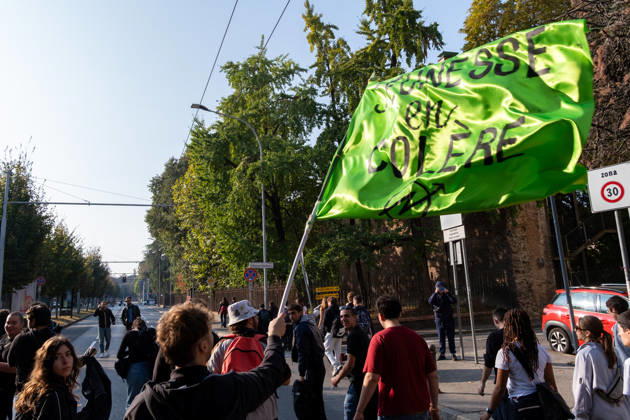 IPA89764841 - A student waves a flag during a student strike. Bologna, Italy, October 16, 2026.  Copyright: xLeonardoxGaravaglia LiveMediax xLeonardoxGaravaglia LiveMediax IPA89764841