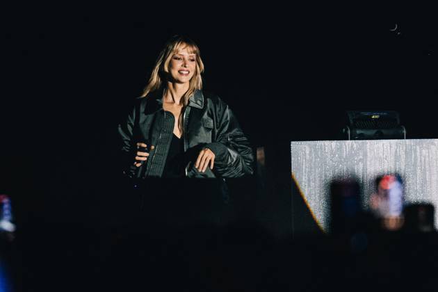 Belgian singer Angele pictured during the Angele Instinct Release Party , a surprise party organized by the Brussels singer to celebrate the release of her album Instinct at the Grote Markt Grand Place, in Brussels, Friday 16 October 2026.  EMILExWINDAL 190025618