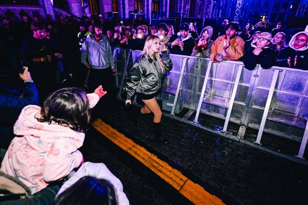 Belgian singer Angele pictured during the Angele Instinct Release Party , a surprise party organized by the Brussels singer to celebrate the release of her album Instinct at the Grote Markt Grand Place, in Brussels, Friday 16 October 2026.  EMILExWINDAL 190036453