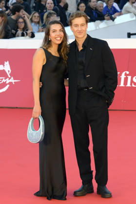 Alexander Fehling mit Freundin bei der Premiere des Kinofilms Eurotrash auf dem 21. Internationalen Filmfestival von Rom Festa del Cinema di Roma 2026 im Auditorium Parco della Musica. Rom, 16.10.2026