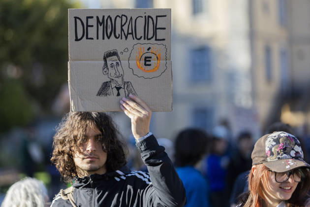 High Cost of Living Protest - Gap A demonstrator holds a placard reading Démocracide during the march in Gap, France, on October 17, 2026. Photo by Thibaut Durand ABACAPRESS.COM Gap Provence-Alpes-Cote d Azur France  Copyright: xDurandxThibaut ABACAx