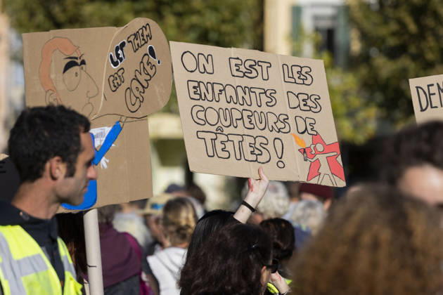 High Cost of Living Protest - Gap A caricature and a placard reading On est les enfants des coupeurs de têtes ! ( We are the children of the head-cutters! ) rise above the march in Gap, France, on October 17, 2026. Photo by Thibaut Durand ABACAPRESS.COM Gap Provence-Alpes-Cote d Azur France  Copyright: xDurandxThibaut ABACAx