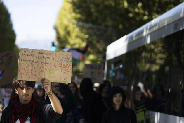 High Cost of Living Protest - Gap A young demonstrator holds a handwritten cardboard sign above the march in Gap, France, on October 17, 2026. The wording is partly obscured and cannot be transcribed reliably. Photo by Thibaut Durand ABACAPRESS.COM Gap Provence-Alpes-Cote d Azur France  Copyright: xDurandxThibaut ABACAx