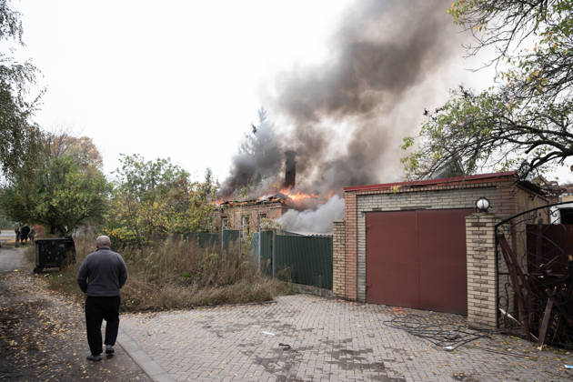 October 17, 2026, Sloviansk, Donetsk Oblast, Ukraine: Emergency services respond following a Russian attack on a residential neighbourhood in Sloviansk, Donetsk Oblast, Ukraine, as firefighters work to extinguish a blaze at a damaged house. Residents continue their daily lives amid the ongoing war. Sloviansk Ukraine  - ZUMAm350 20261017_zip_m350_007 Copyright: xCameronxJones-Manleyx