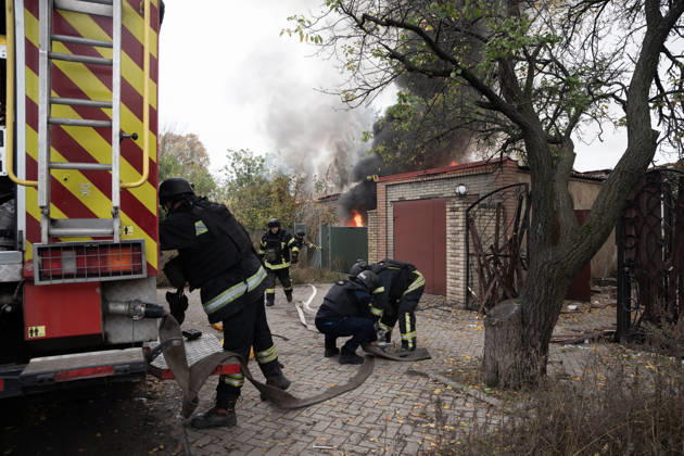 October 17, 2026, Sloviansk, Donetsk Oblast, Ukraine: Emergency services respond following a Russian attack on a residential neighbourhood in Sloviansk, Donetsk Oblast, Ukraine, as firefighters work to extinguish a blaze at a damaged house. Residents continue their daily lives amid the ongoing war. Sloviansk Ukraine  - ZUMAm350 20261017_zip_m350_009 Copyright: xCameronxJones-Manleyx