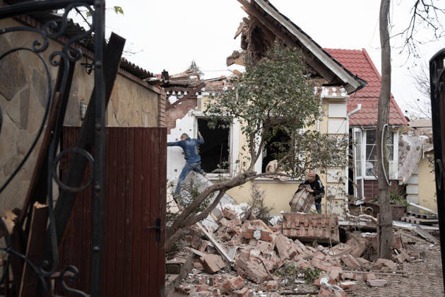 October 17, 2026, Sloviansk, Donetsk Oblast, Ukraine: Emergency services respond following a Russian attack on a residential neighbourhood in Sloviansk, Donetsk Oblast, Ukraine, as firefighters work to extinguish a blaze at a damaged house. Residents continue their daily lives amid the ongoing war. Sloviansk Ukraine - ZUMAm350 20261017_zip_m350_008 Copyright: xCameronxJones-Manleyx